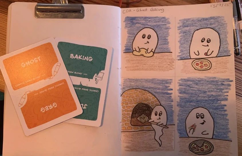 Chaotic Draw Along Ghost and Baking prompt cards beside an open sketchbook with a four-panel ghost baking pizza drawing.